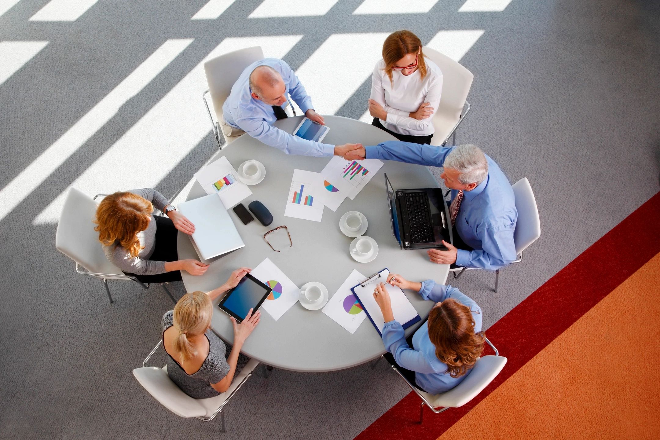 Diverse business team collaborating around a table
